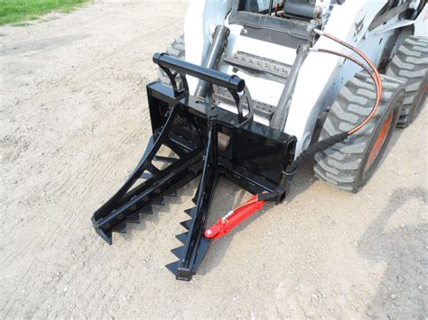 skid-steer bucket clamp-on tree and post puller|bobcat skid steer puller.